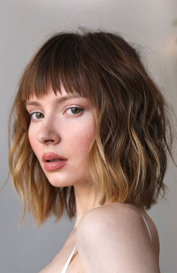 Flippy lob with wispy bangs