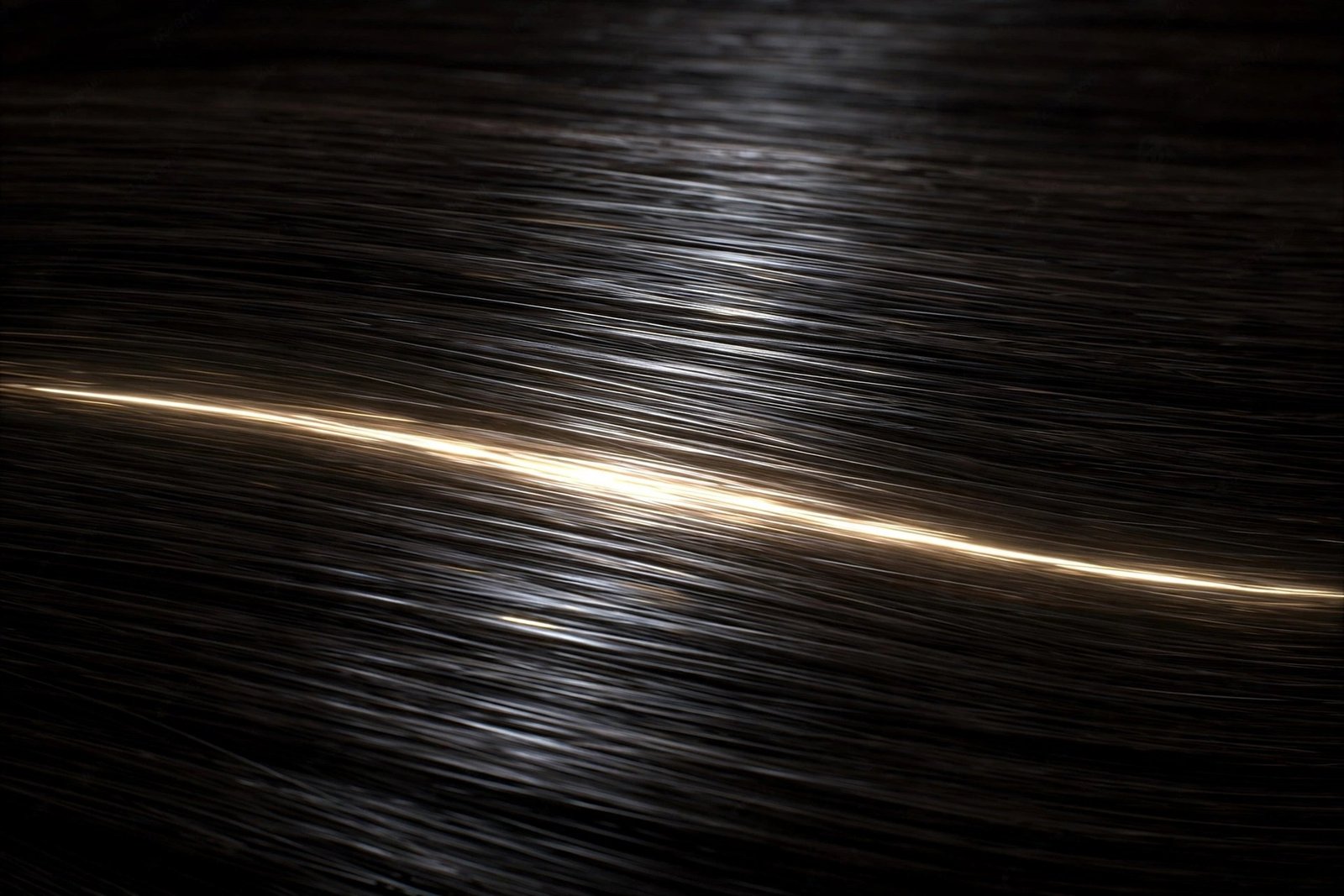 Extreme close-up of ultra-glossy straight hair showing a clean continuous light reflection streak along the strands, mac