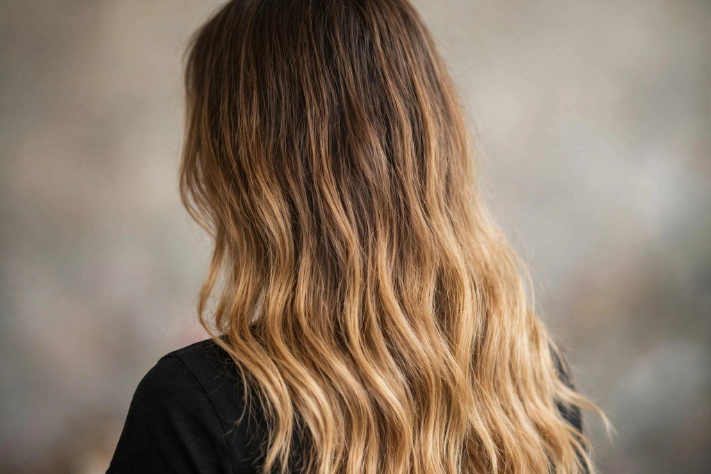 Honey blonde ombre gradient on long hair