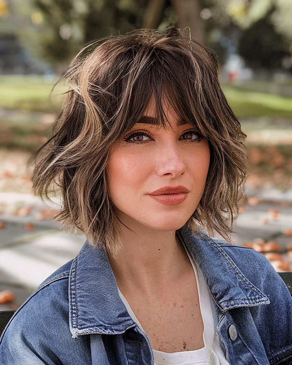 Wavy Riviera bob on thick hair with soft interior layers