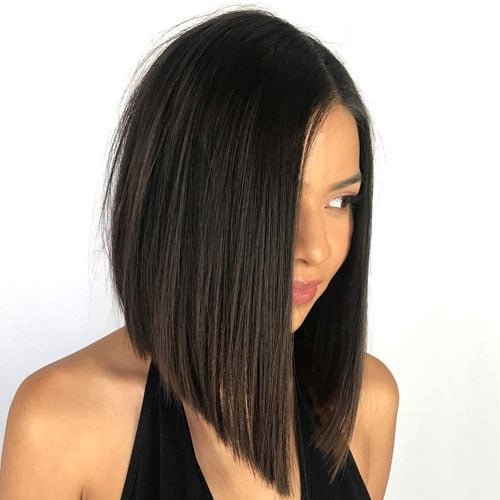 Riviera bob with blonde face-framing highlights outdoors
